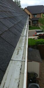 After gutter cleaning: clean gutter with debris removed